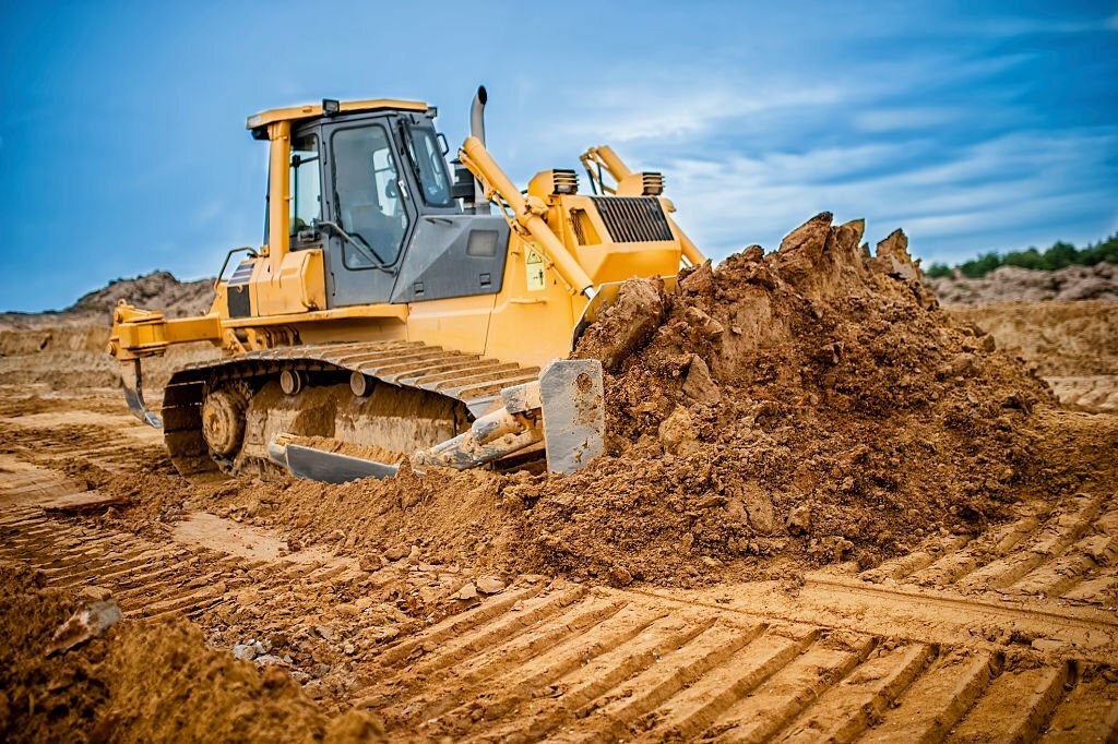 backhoe loader vs bulldozer