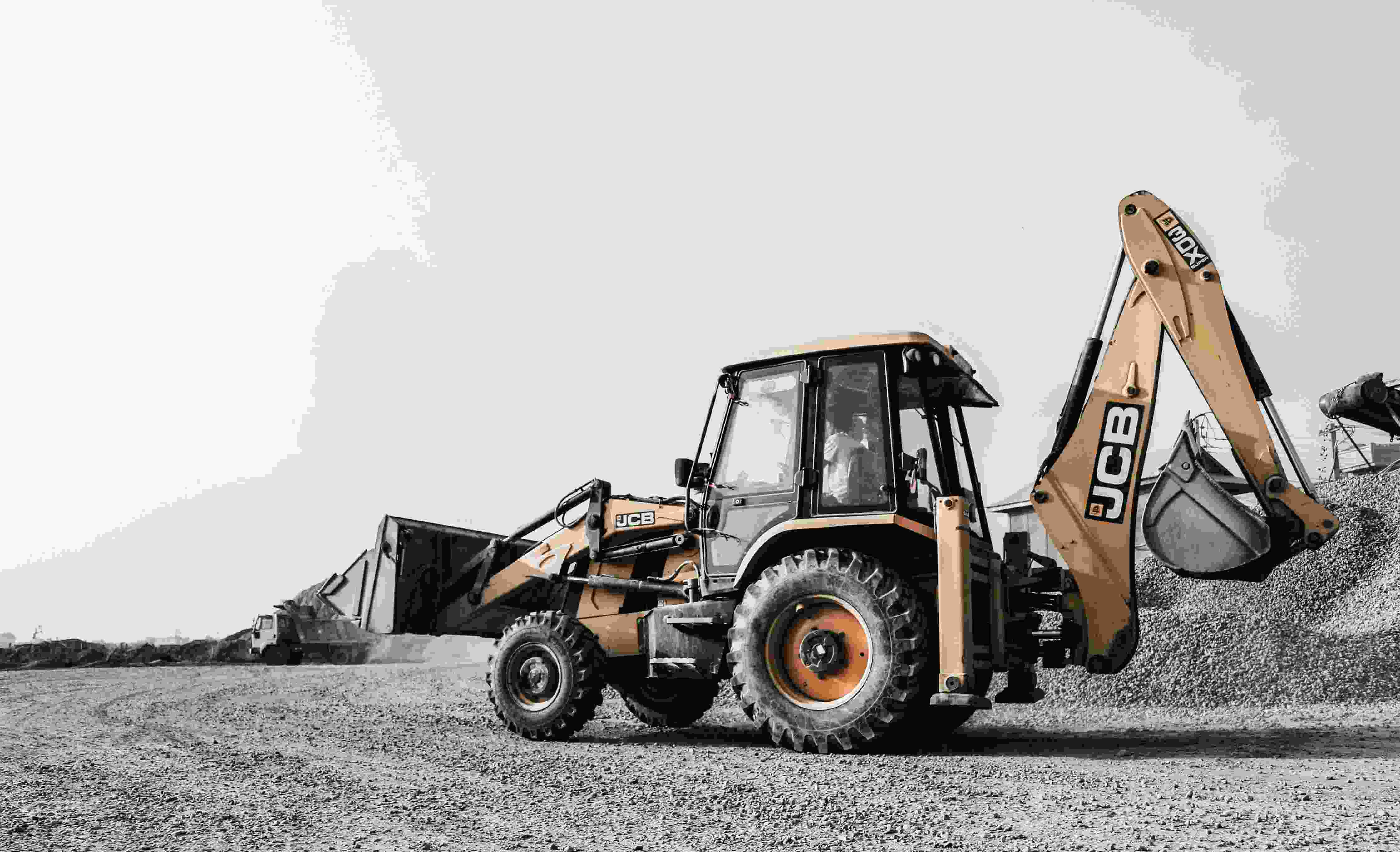 kapasitas Backhoe Loader